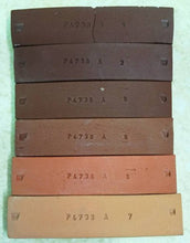 Load image into Gallery viewer, A terra cotta clay fired from cone 06 (bottom) to 4
